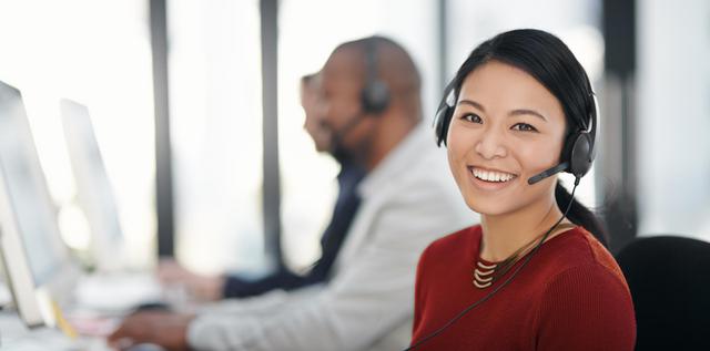 photo of a phone dispatcher taking a security alarm call